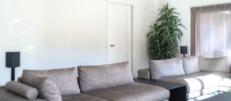 Pair of speakers placed at the correct distance from each other in a living room